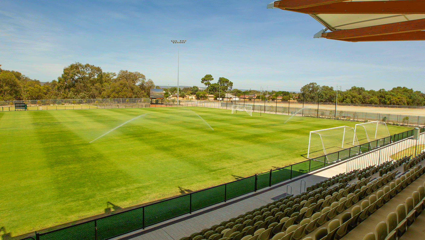 Sprinkers on the pitch at the Sam Kerr Football Stadium